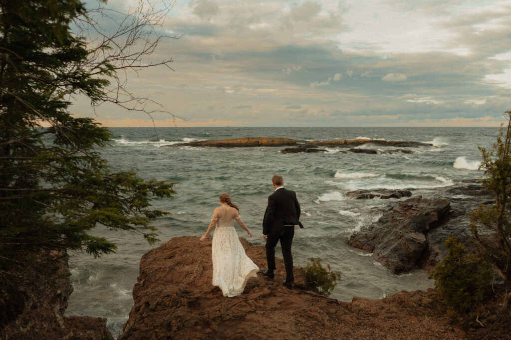 Rugged cliffside wedding portraits in the Upper Peninsula