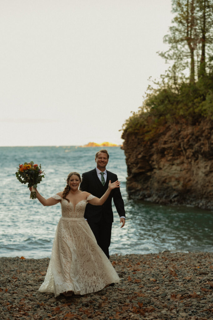 happy bride after wedding ceremony in black rocks marquette